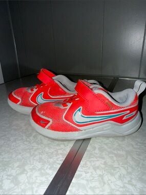 Nike Kids Bright Red Sneakers with Teal Accents